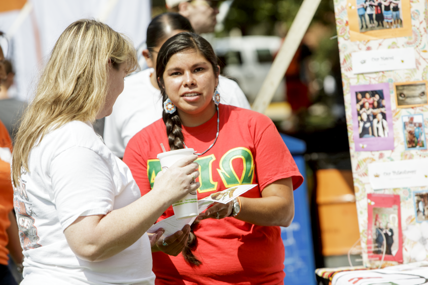 Alpha Pi Omega sister shares about the organization at a CSN event