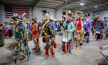 grand entry photos of mens grass dancers 2024 powwow